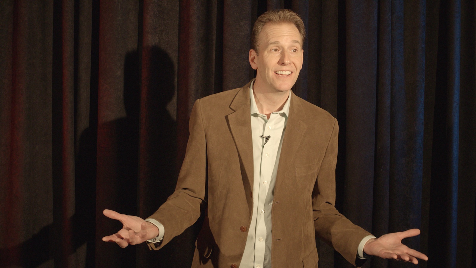 Jeff Stein speaking on stage